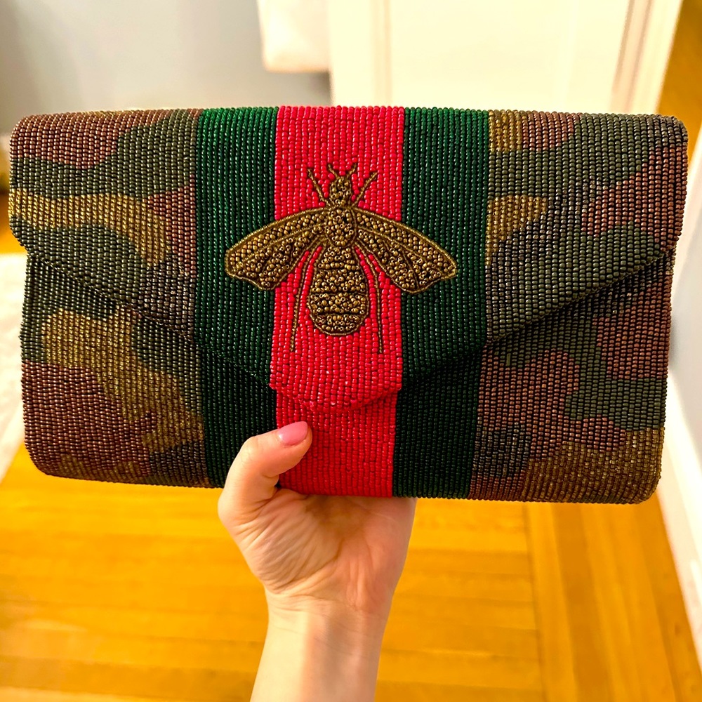 Never used still with tag army print clutch